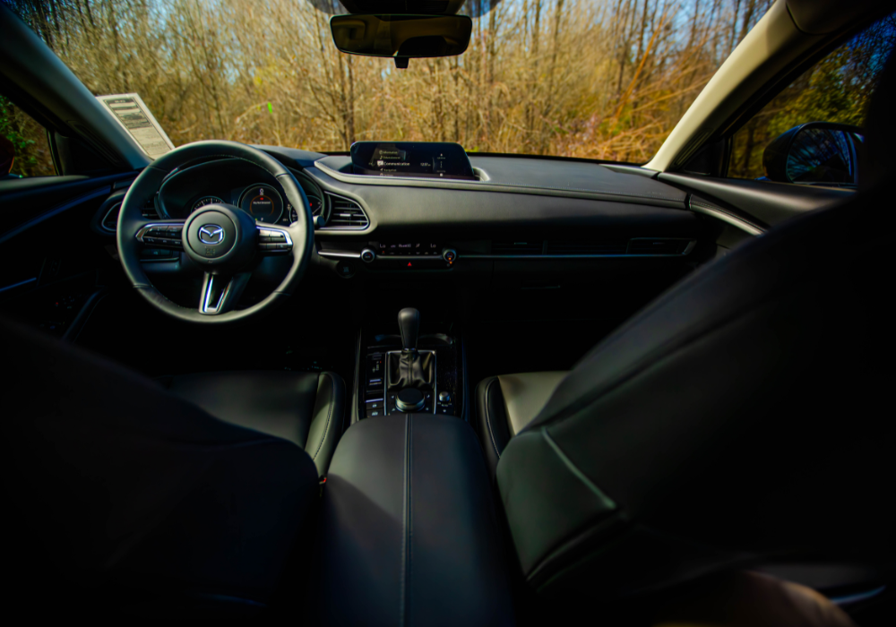 Mazda CX-90 interior, including the steering wheel and front dash